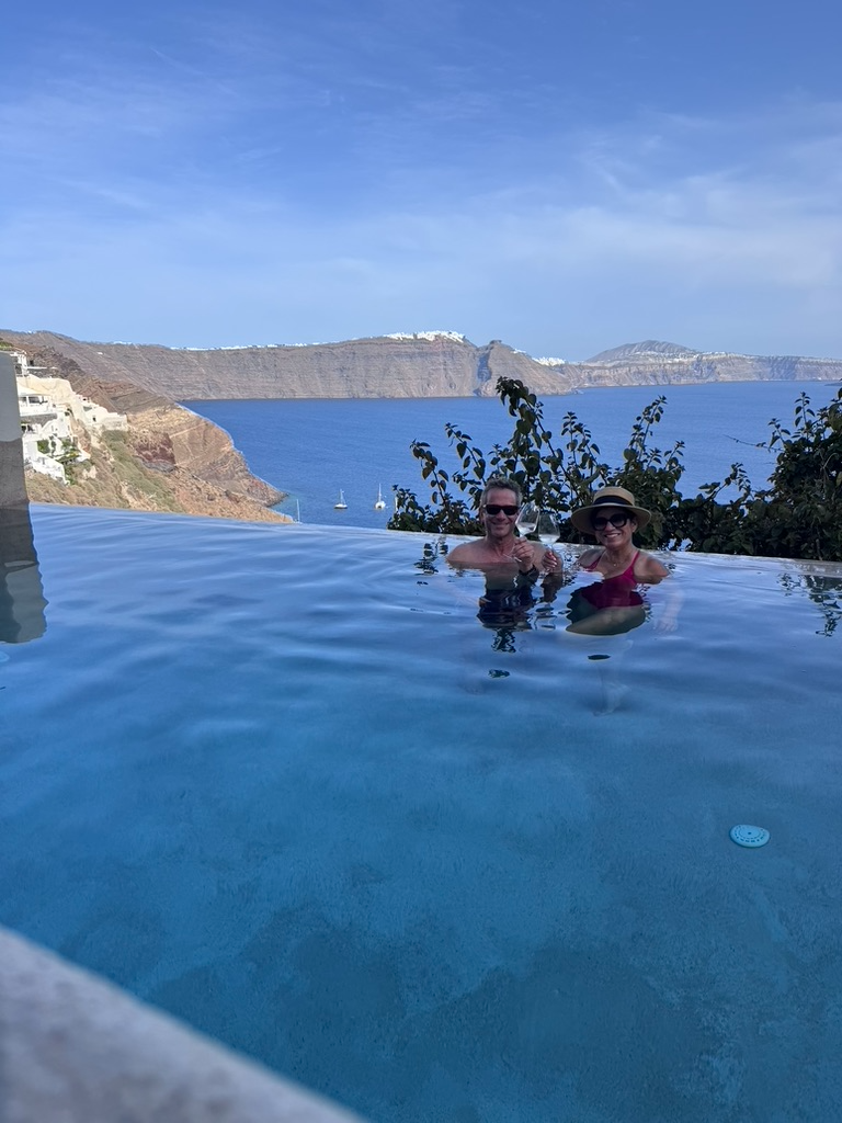 David and Kandi enjoying champagne together in the pool